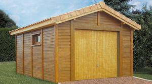 garage en béton aspect bois 2 pentes couverture tuiles entrée en pignon avec 1 portail basculant