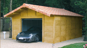 garage en béton aspect bois 2 pentes couverture tuiles entrée en pignon