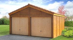 garage en béton aspect bois 2 pentes couverture tuiles entrée en pignon avec 2 portails sectionnelles