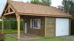 garage en béton aspect bois 2 pentes couverture tuiles entrée en façade avec 1 portail basculant et un auvent accolé en pignon
