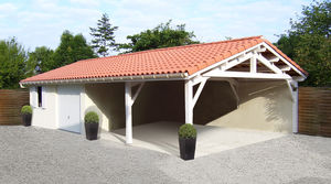 garage en béton 2 pentes couverture tuiles et auvent accolé