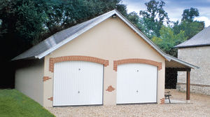 garage en béton 2 pentes couverture ardoise entrée en pignon avec 2 portes basculantes